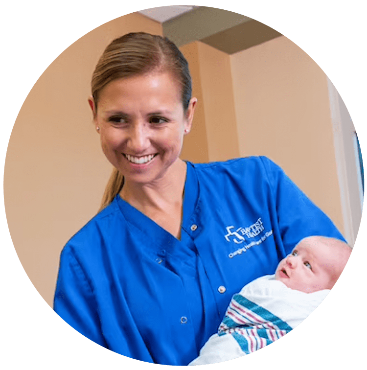 Baptist Labor & Delivery Nurse with baby